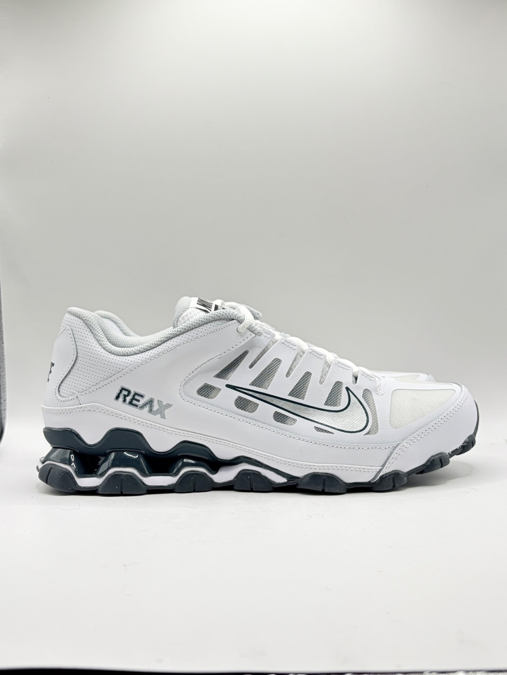 Nike Reax 8 TR Mesh training shoes in White and Metallic Silver, men’s size 10.